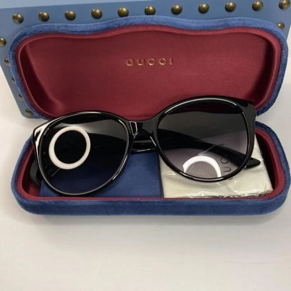 GUCCI GG0631S 001 round sunglass comes black frame with grey gradient lenses